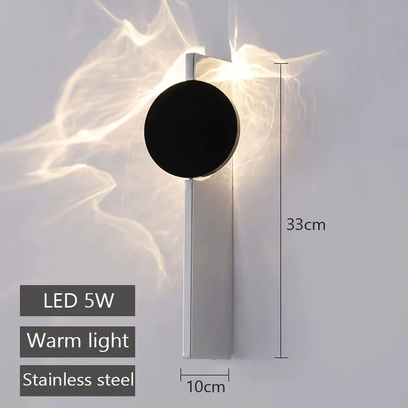 Wall-mounted light fixture with dimensions and features on a white background